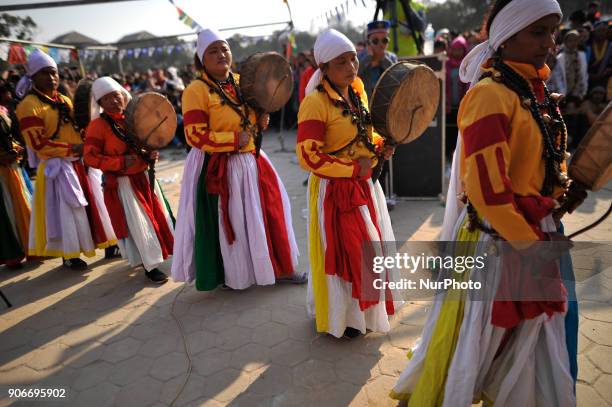 Nepalese people from Tamang community plays traditional instruments during celebration of Sonam Losar festival or Lunar New Year, which occurs around...