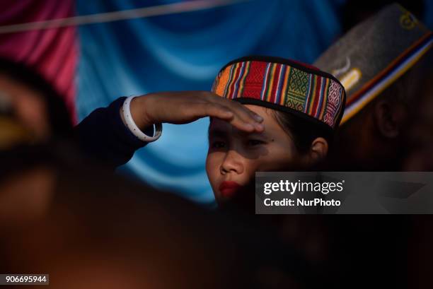 Girl arrive to participate in celebration of Sonam Losar festival or Lunar New Year, which occurs around the same time of year as does Chinese and...