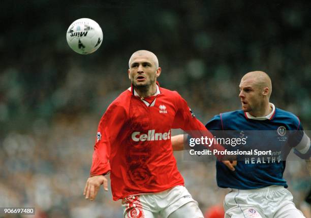 Fabrizio Ravanelli of Middlesbrough and Sean Dyche of Chesterfield in action during the FA Cup Semi Final at Old Trafford on April 13, 1997 in...