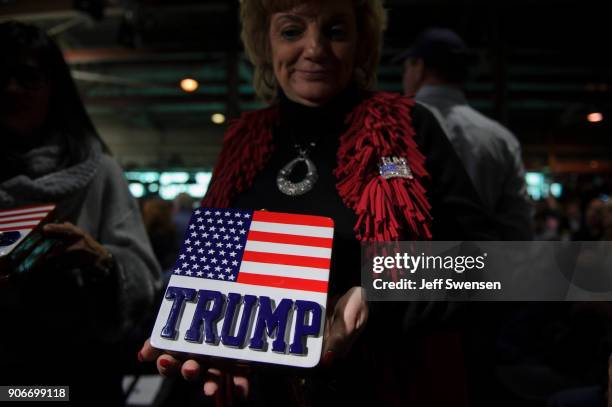 Supporters of President Donald J Trump gathered in the 18th Congressional District to listen to the president speak at a rally at H&K Equipment, a...