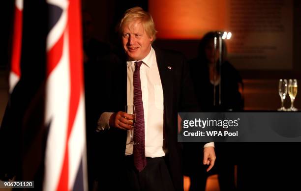 Britain's Foreign Secretary Boris Johnson attends an official dinner at the Victoria and Albert Museum with British Prime Minister Theresa May and...