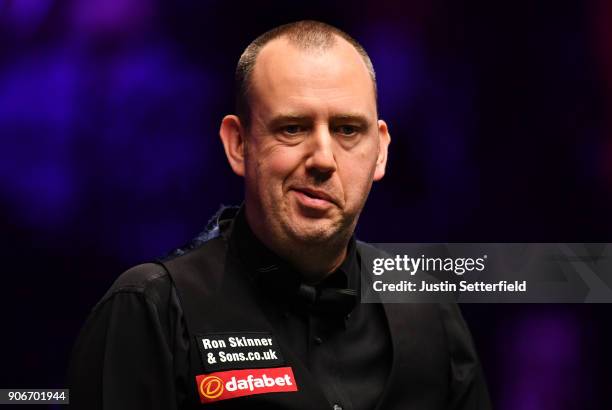 Mark Williams of Wales reacts during his match against Kyren Wilson of England during The Dafabet Masters on Day Five at Alexandra Palace on January...