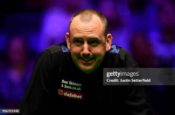 Mark Williams of Wales reacts during his match against Kyren Wilson of England during The Dafabet Masters on Day Five at Alexandra Palace on January...