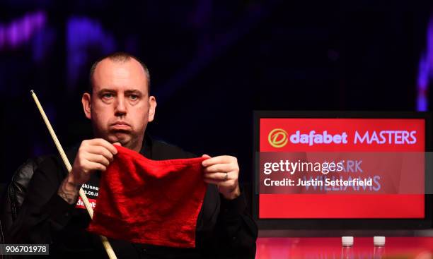 Mark Williams of Wales reacts during his match against Kyren Wilson of England during The Dafabet Masters on Day Five at Alexandra Palace on January...