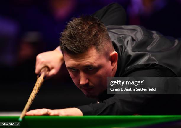 Kyren Wilson of England in action during his match against Mark Williams of Walesduring The Dafabet Masters on Day Five at Alexandra Palace on...