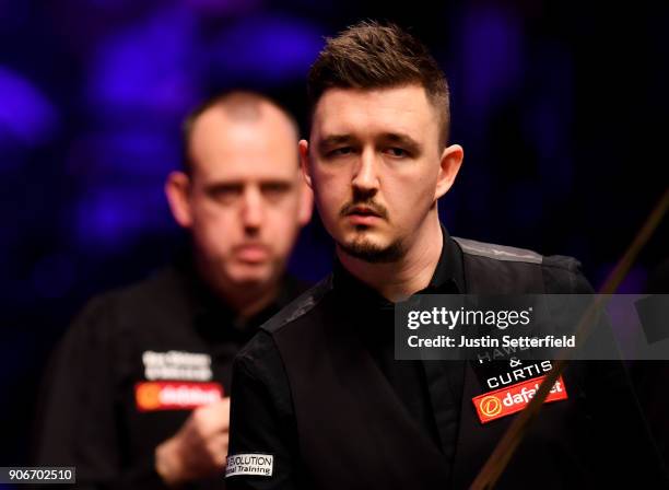 Kyren Wilson of England looks on during his match against Mark Williams of Walesduring The Dafabet Masters on Day Five at Alexandra Palace on January...