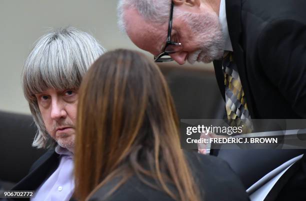 David Turpin with attorneys David Macher an Allison Lowe is seen during his court arraignment in Riverside, California on January 18, 2018. . The...