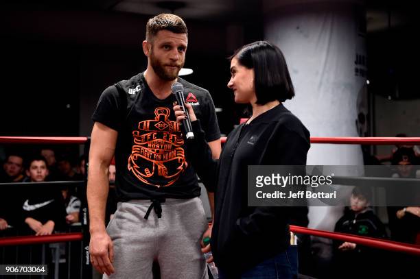 Calvin Kattar is interviewed by UFC host Megan Olivi during an open workout session for fans and media at Reebok Headquarters on January 17, 2018 in...