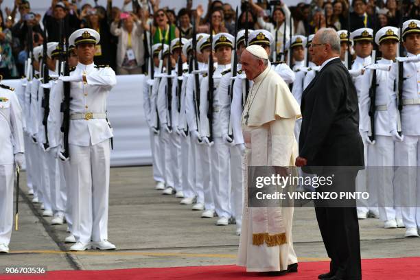 Peruvian President Pedro Pablo Kuczynski welcomes Pope Francis to Peru at an air force base in Lima on January 18, 2018. Pope Francis headed Thursday...