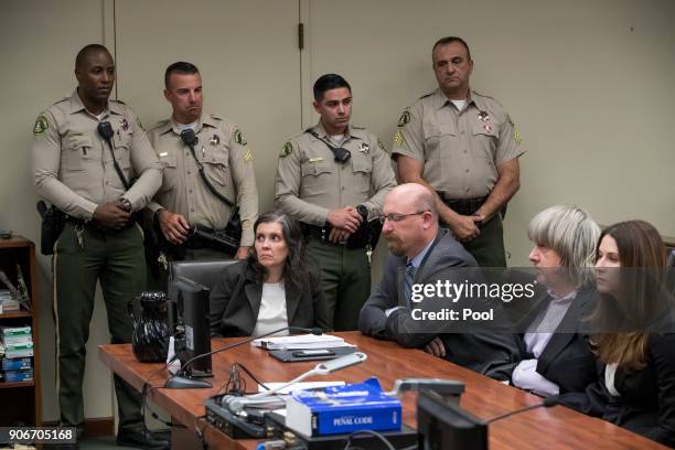 Louise Anna Turpin David Allen Turpin , accused of holding their 13 children captive, appear in court for arraignment with attorneys Jeff Moore and...