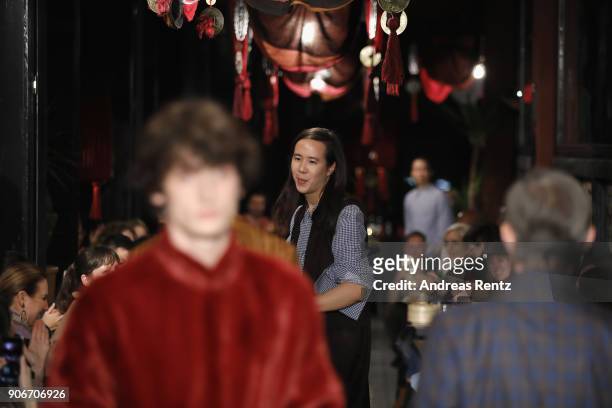 Designer William Fan is applauded on the catwalk at the William Fan Defilee during 'Der Berliner Salon' AW 18/19 on January 18, 2018 in Berlin,...