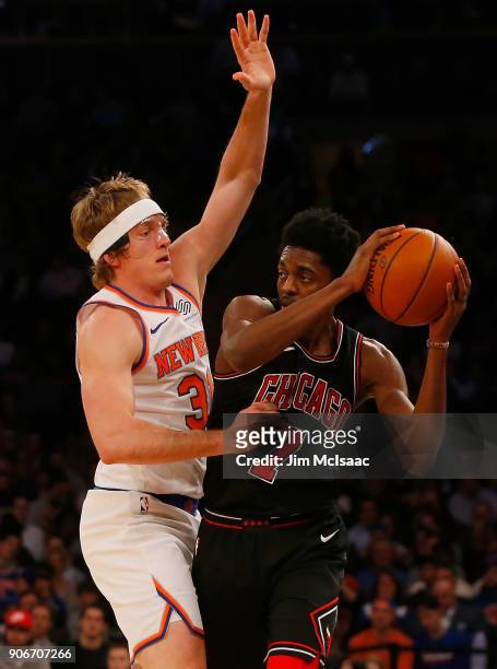 Justin Holiday of the Chicago Bulls in action against Ron Baker of the New York Knicks at Madison Square Garden on January 10, 2018 in New York City....
