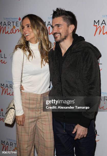 Karen Martinez and Juanes are seen at the T.J. Martell Foundation Martell In Miami Charity Luncheon during NATPE 2018 at the Eden Roc Hotel on...