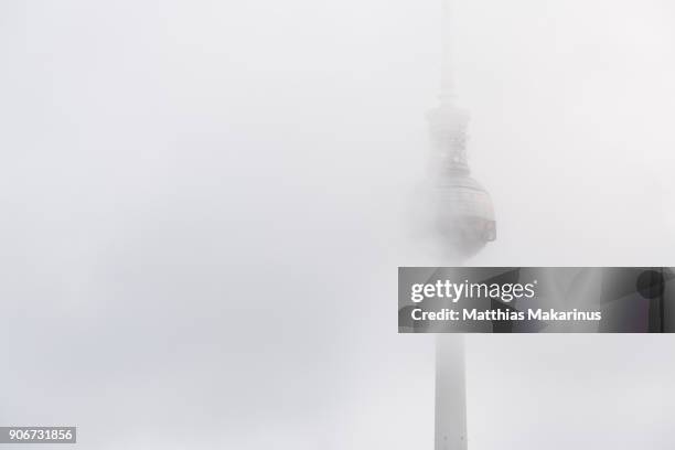 berlin television tower with foggy - matthias makarinus stock-fotos und bilder