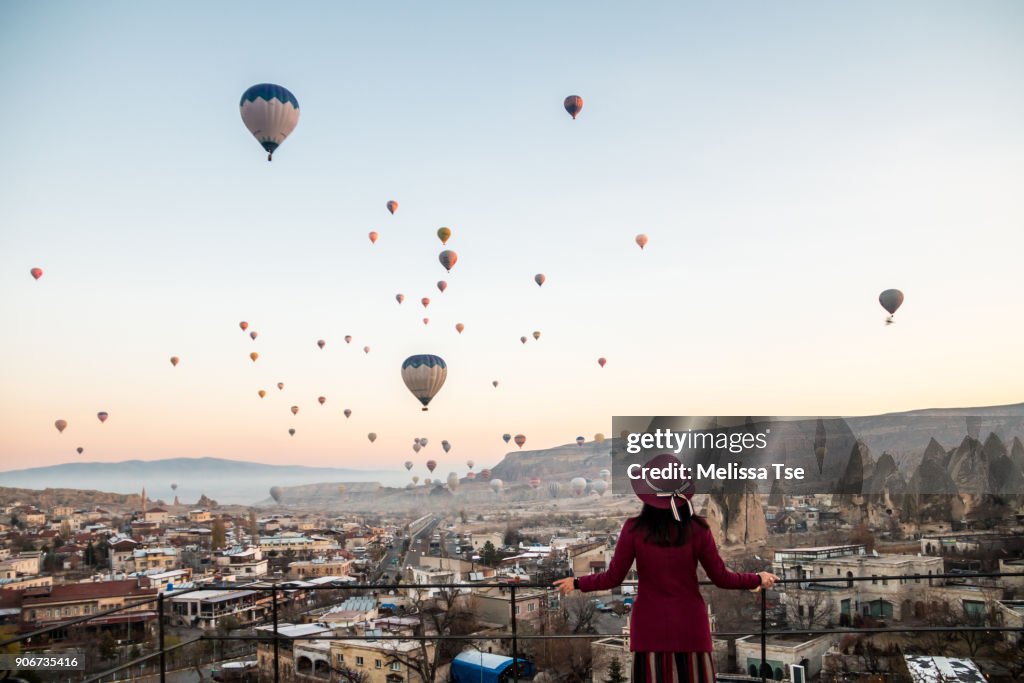 Woman Watching Hot Air Balloons in Cappadocia