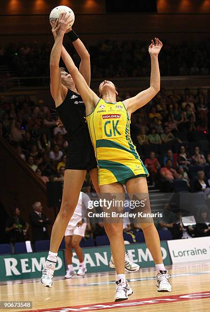 Irene Van Dyk of the Silver Ferns and Susan Fuhrmann of the Diamonds compete for the ball during the Third Netball Test between the Australian...