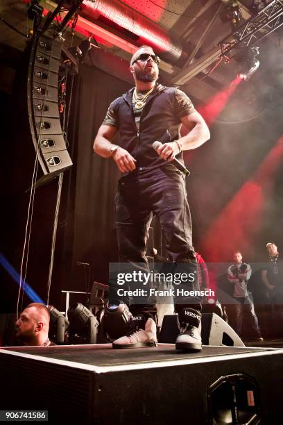 German rapper Kollegah performs live on stage during a concert at the Columbiahalle on January 18, 2018 in Berlin, Germany.