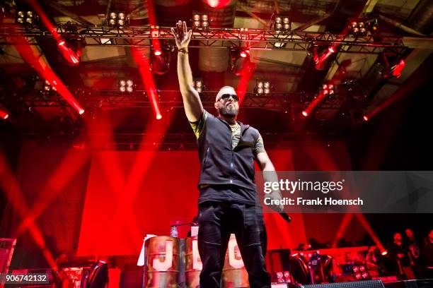 German rapper Kollegah performs live on stage during a concert at the Columbiahalle on January 18, 2018 in Berlin, Germany.