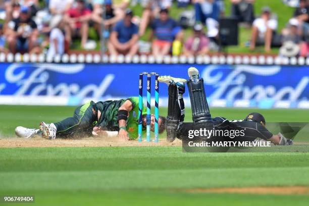 Pakistan's Rumman Raees attempts to run out New Zealand's Tom Latham during the 5th one-day international cricket match between New Zealand and...