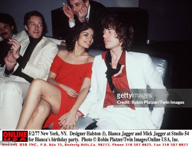 New York, NY. Fashion designer Halston with Bianca & Mick Jagger at Studio 54 for Bianca's birthday party.