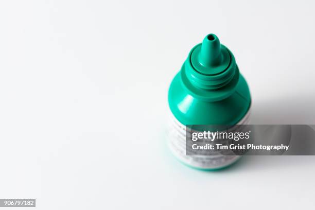 small bottle of eye drops. - augentropfen stock-fotos und bilder