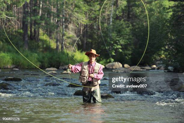 trout fishing - trout fishing stock pictures, royalty-free photos & images