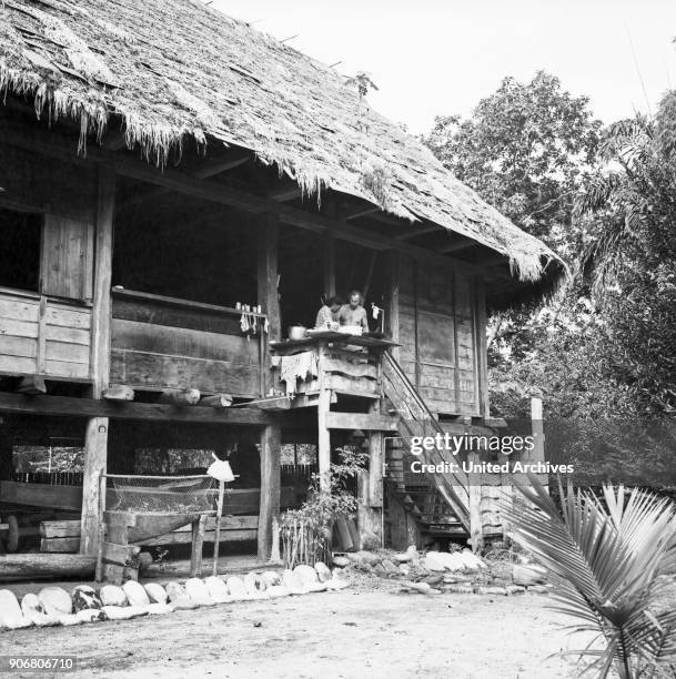 Visit at hermit and gold panner Don Jorge at Rio Napo, Ecuador 1960s.