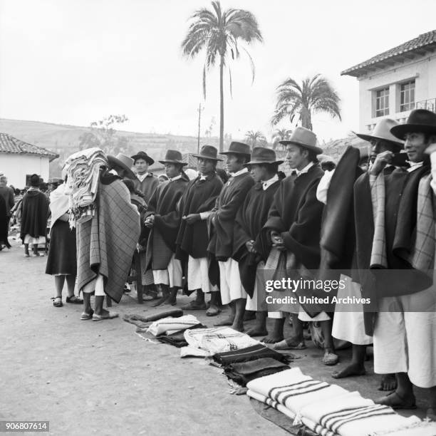 People at the market in the city of Otavalo, Ecuador 1960s.