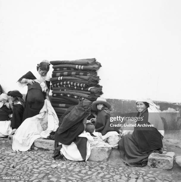 People at the market in the city of Otavalo, Ecuador 1960s.