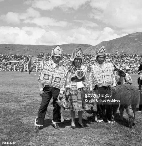 Carnival in Peru - disguised folks celebrating the Candelaria at Puno, Peru 1960s.