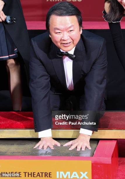 Director Xixi Gao is honored with his hands and footprints in cement ceremony at The TCL Chinese Theatre at TCL Chinese Theatre on January 18, 2018...