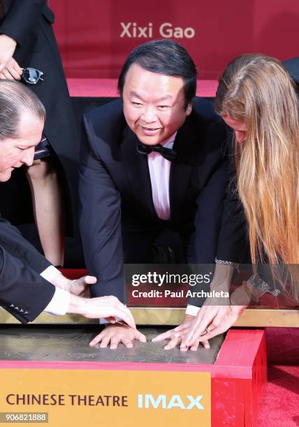 Director Xixi Gao is honored with his hands and footprints in cement ceremony at The TCL Chinese Theatre at TCL Chinese Theatre on January 18, 2018...