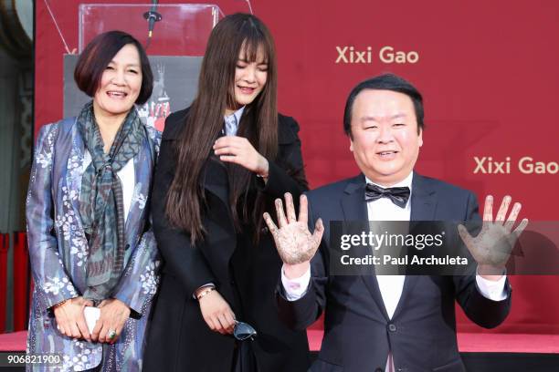 Director Xixi Gao is honored with his hands and footprints in cement ceremony at The TCL Chinese Theatre at TCL Chinese Theatre on January 18, 2018...