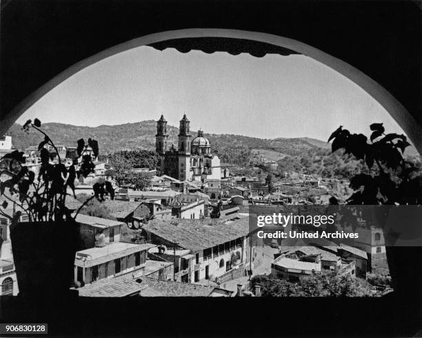 View to the city of Taxco with its Santa Prisca church, Mexico 1970s.