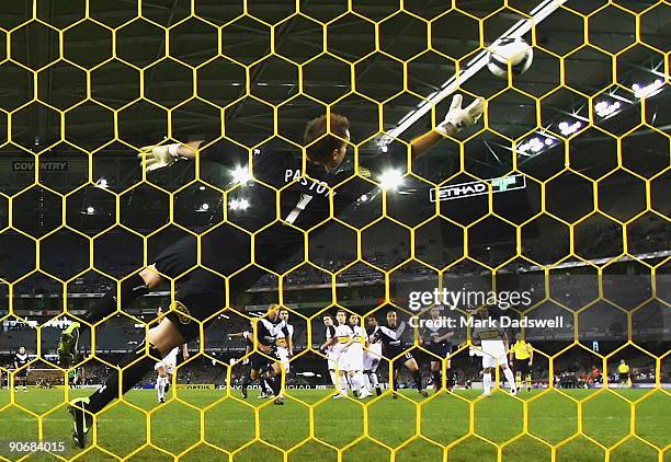 Carlos Hernandez of the Victory beats Mark Paston of the Phoenix with a free kick during the round six A-League match between the Melbourne Victory...