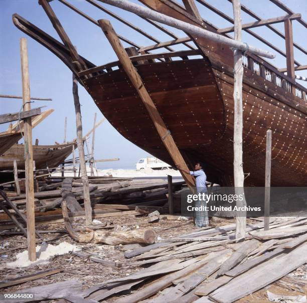 The Dhow shipyard of Sharjah, United Arab Emirates 1970s.