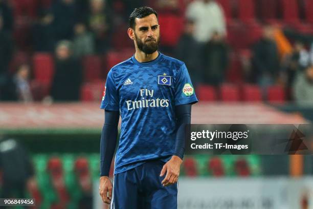 Mergim Mavraj of Hamburg looks dejected during the Bundesliga match between FC Augsburg and Hamburger SV at WWK-Arena on January 13, 2018 in...