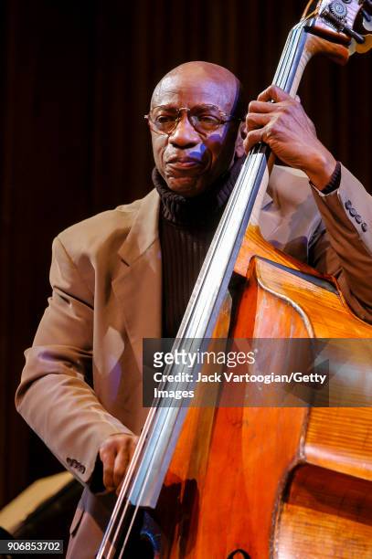 American Jazz musician Reggie Workman plays upright acoustic bass as he performs onstage during the Archie Shepp/Roswell Rudd Live in New York'...