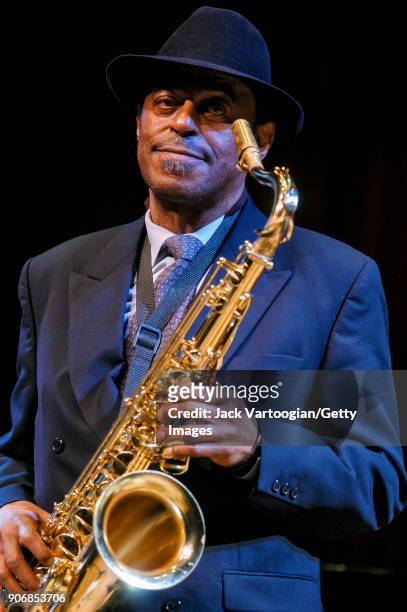 American Jazz musician Archie Shepp plays tenor saxophone as he performs onstage during the Archie Shepp/Roswell Rudd Live in New York' concert at...