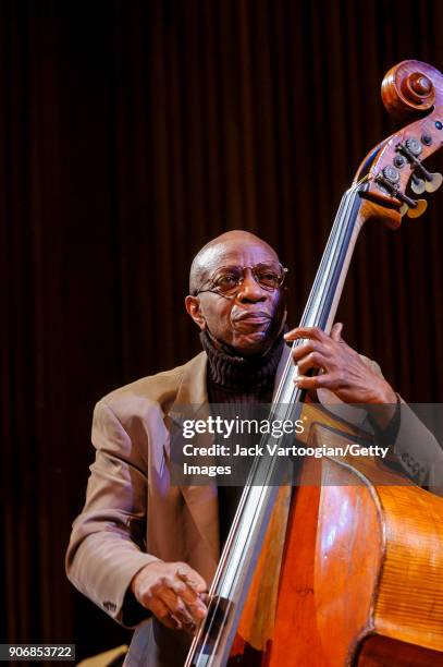 American Jazz musician Reggie Workman plays upright acoustic bass as he performs onstage during the Archie Shepp/Roswell Rudd Live in New York'...