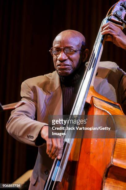 American Jazz musician Reggie Workman plays upright acoustic bass as he performs onstage during the Archie Shepp/Roswell Rudd Live in New York'...