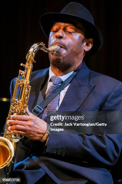 American Jazz musician Archie Shepp plays tenor saxophone as he performs onstage during the Archie Shepp/Roswell Rudd Live in New York' concert at...