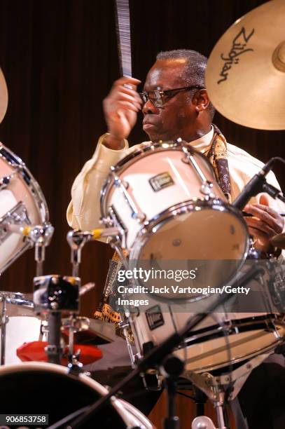American Jazz musician Andrew Cyrille plays drums as he performs onstage during the Archie Shepp/Roswell Rudd Live in New York' concert at Lincoln...