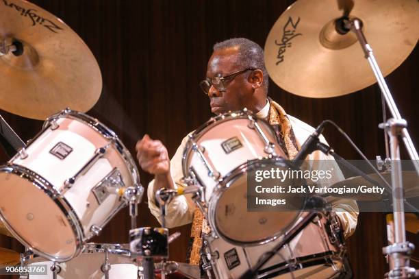 American Jazz musician Andrew Cyrille plays drums as he performs onstage during the Archie Shepp/Roswell Rudd Live in New York' concert at Lincoln...