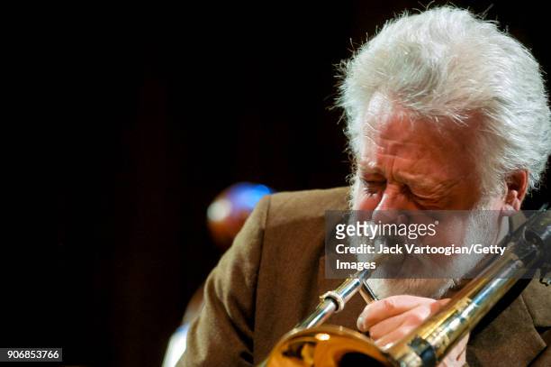 American Free Jazz musician Roswell Rudd plays trombone as he performs onstage during the Archie Shepp/Roswell Rudd Live in New York' concert at...