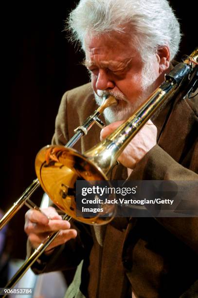 American Free Jazz musician Roswell Rudd plays trombone as he performs onstage during the Archie Shepp/Roswell Rudd Live in New York' concert at...