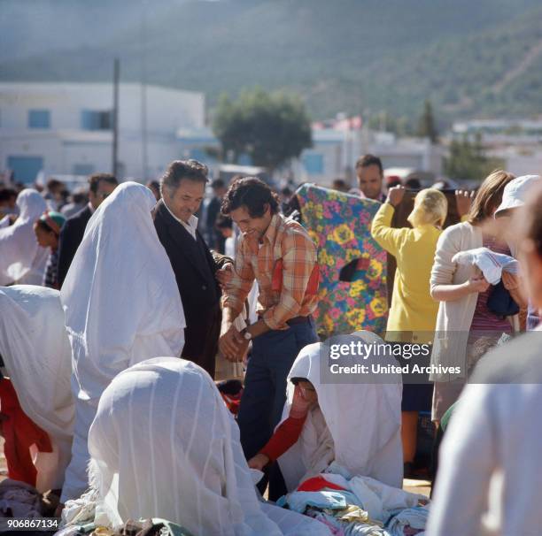 People on a market in Tunisia, 1980s.