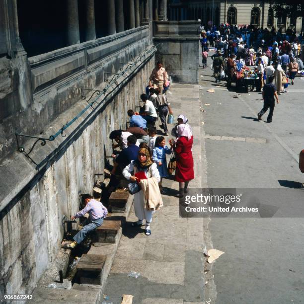 Foot-washing in front of a mosque in Istanbul, Turkey 1980s.
