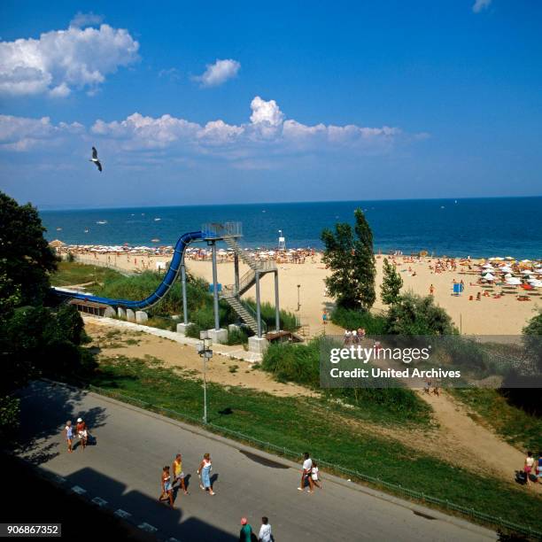 Tourists at the Golden Sands beach at the coast of the Black Sea, Bulgaria 1980s.