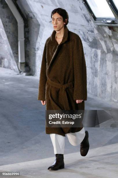 Model walks the runway during the Lemaire Menswear Fall/Winter 2018-2019 show as part of Paris Fashion Week on January 17, 2018 in Paris, France.